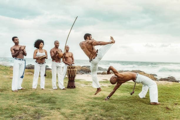 Capoeira Players and Musicians on Beach in Salvador da Bahia