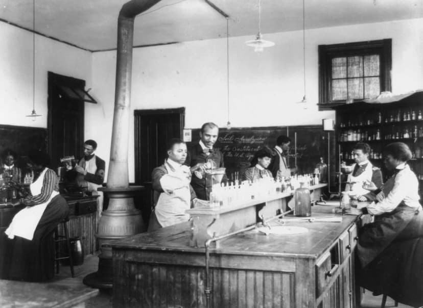 Botanist George Washington Carver with Students in his Laboratory at Tuskegee Institute, 1902